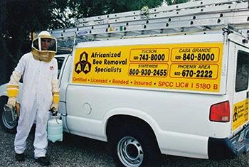 Benson bee removal service truck and employee